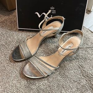 Brand new NINA Silver size 7M